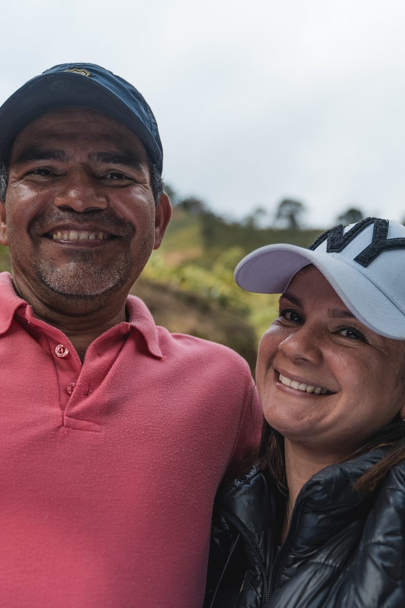 Two growers of the program together on their farm