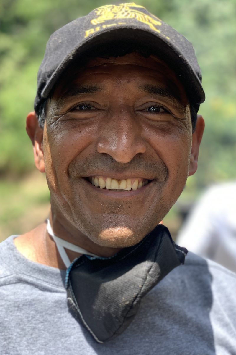 A coffee grower in the program on his own farm